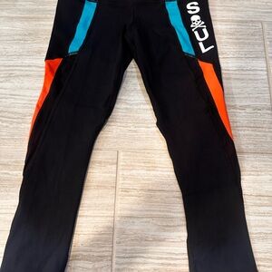 SoulCycle Black and Orange Dynamic workout leggings
 size small